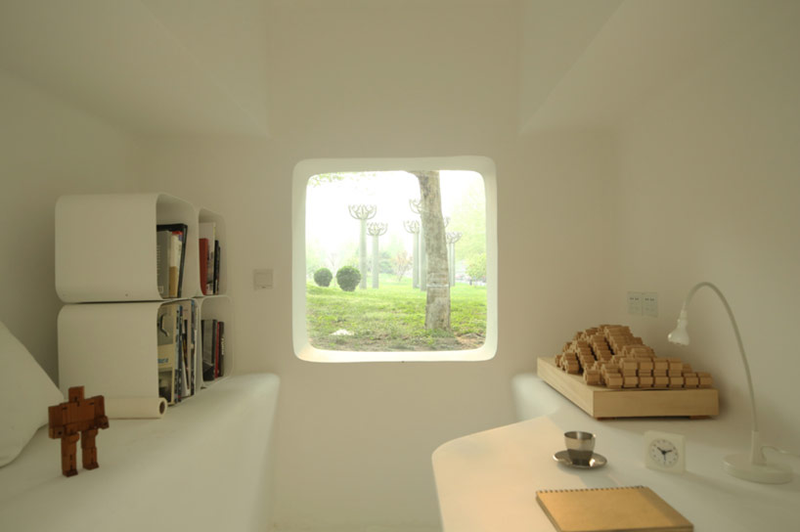 Illustration for article titled Tetris-piece micro house is designed to be stacked